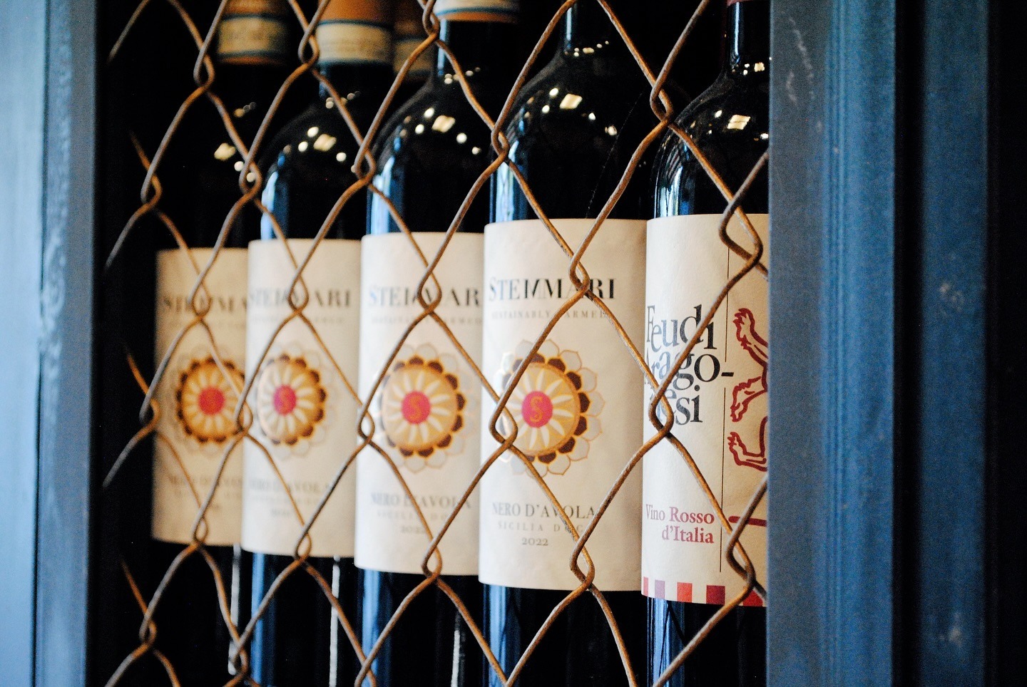 Shelf of Italian red wines