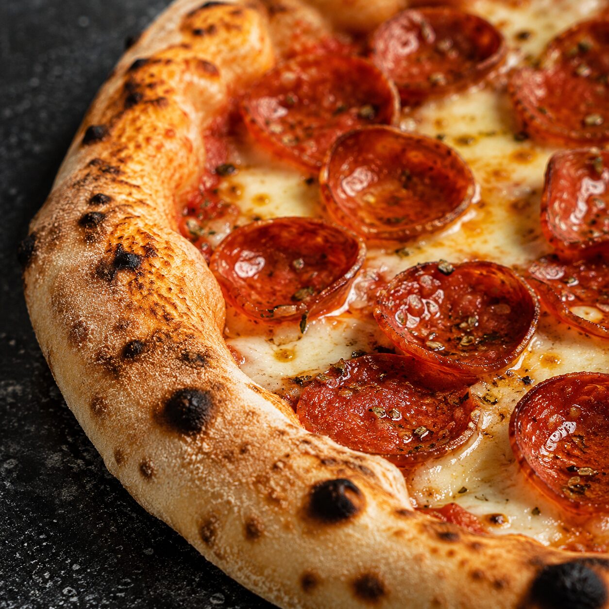 Close-up of pepperoni pizza with melted mozzarella